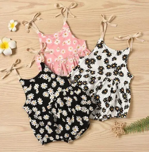 Baby girl's cotton romper dress with cheerful sunflower print, perfect for summer playtime.