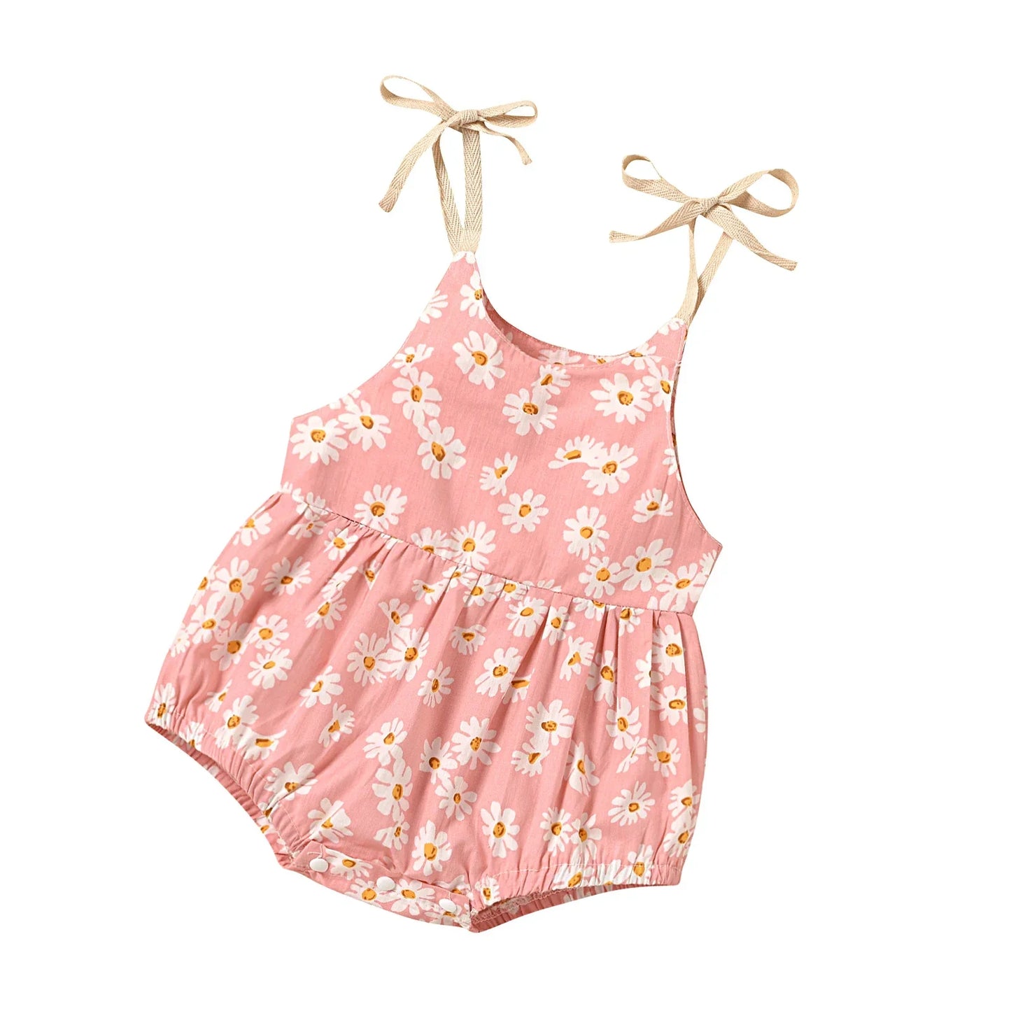 Close-up of the sunflower print on a girls' cotton romper dress, showcasing cheerful design.