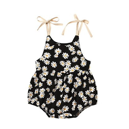 Toddler girl's summer outfit: comfortable cotton romper dress with an all-over sunflower print.