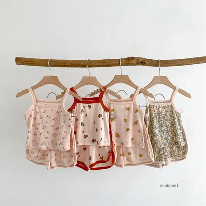 Kids fashion baby girl's fruit print cotton top and shorts set, perfect summer playwear for infants.