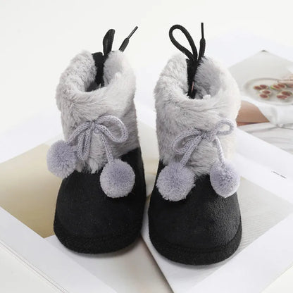Soft and cozy pink baby girl winter boots, fluff ball detail, perfect first walkers and infants