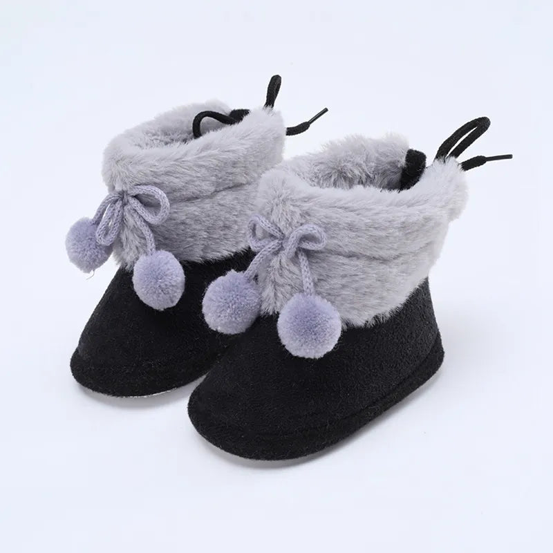 Winter snow fluff ball booties for baby girls, soft sole newborn footwear in lovely pink