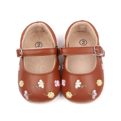 Chic baby sandals featuring embroidered flowers, perfect for summer style
