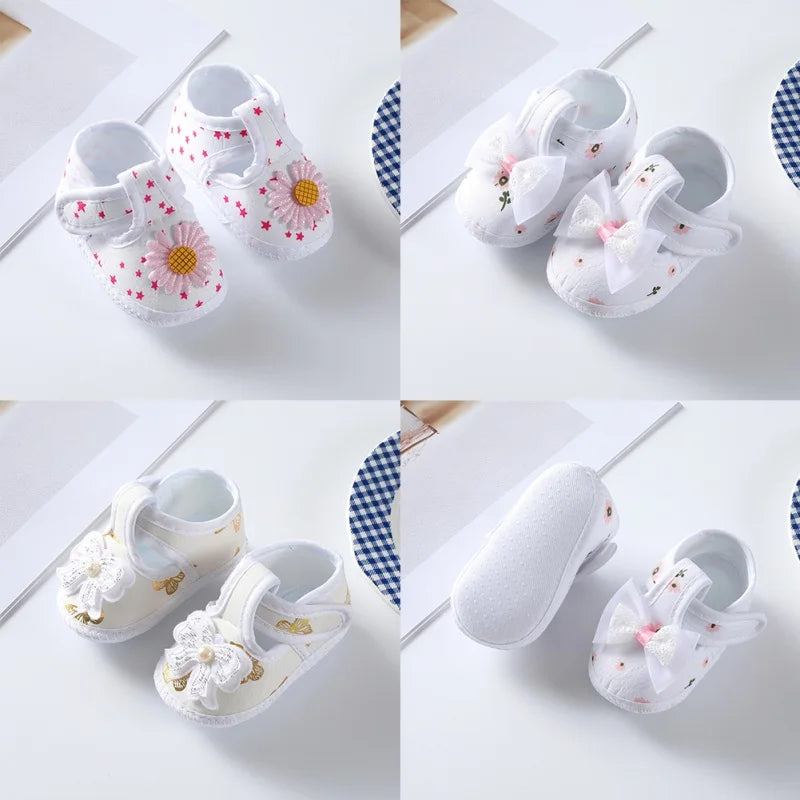 Infant girl's floral bow soft-soled crib shoes, designed for comfort and style, essential baby accessory.