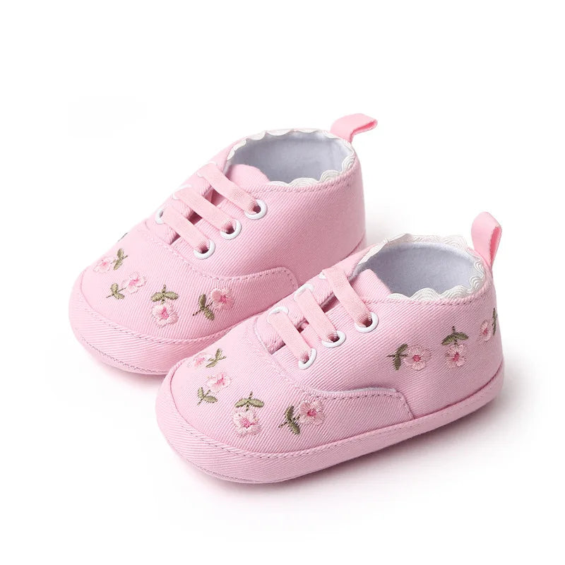 Cute baby girl's floral embroidered lace-up soft sole shoes, ideal for spring