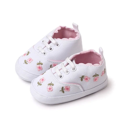 Toddler girl's floral embroidered soft sole shoes with adjustable lace-up ties