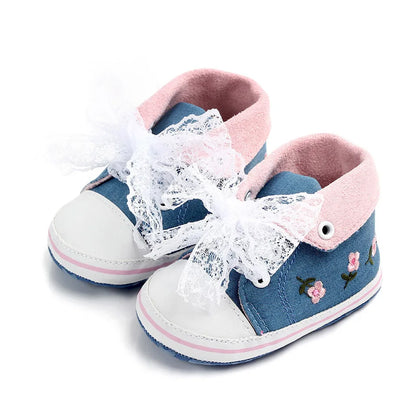 Soft sole baby girl's shoes, intricate floral embroidery, classic lace-up style