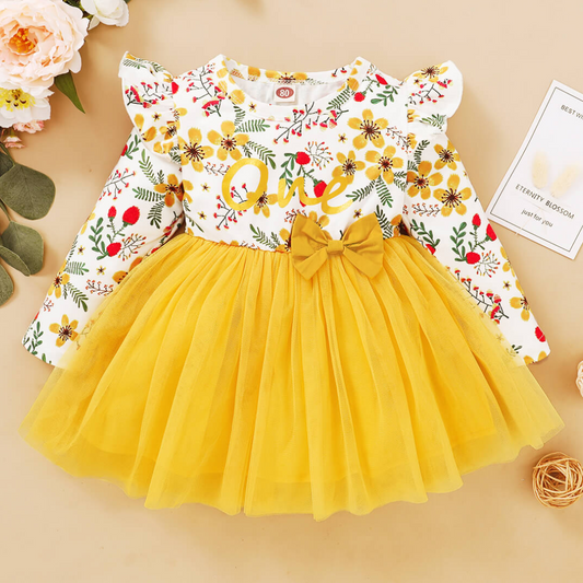 Baby girl's floral long sleeve dress with colorful butterfly print, perfect for play.