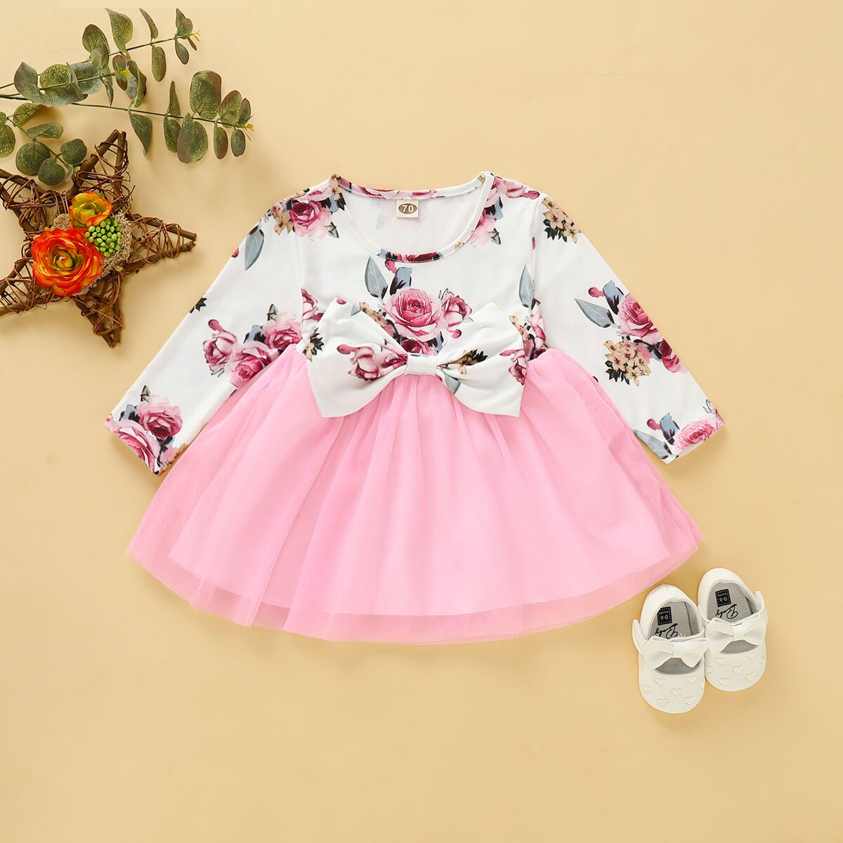 Girls' long sleeve dress featuring vibrant floral and butterfly patterns, a stylish baby outfit.