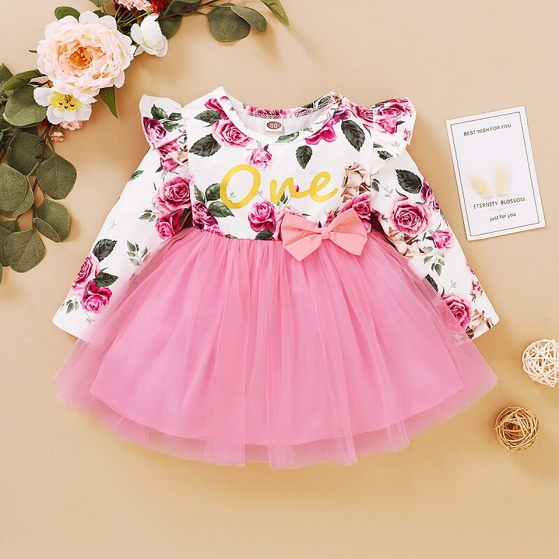 Adorable baby girl's floral butterfly long sleeve dress, a charming addition to kids' fashion.