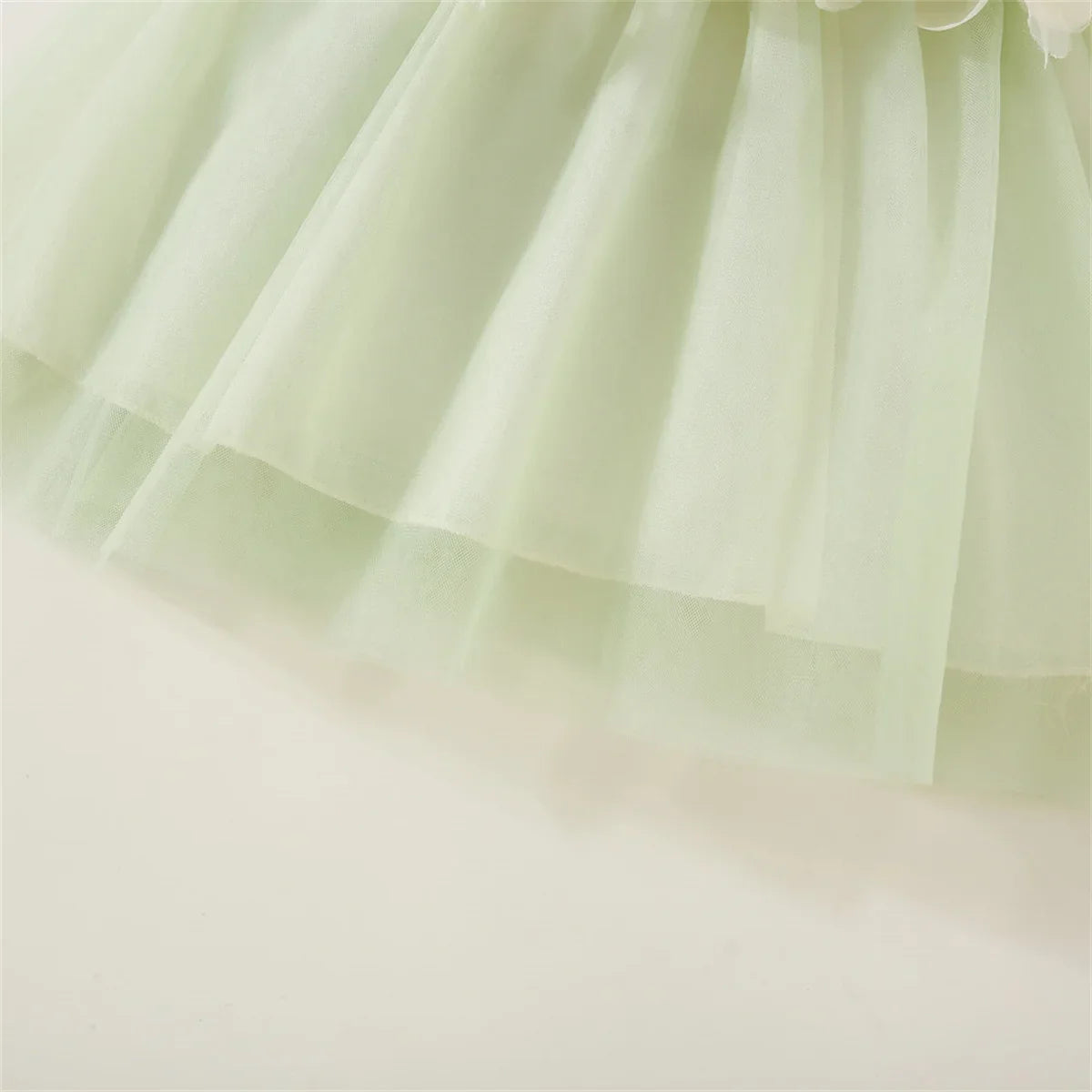 Baby girl's delicate floral mesh dress, soft and stylish for any special occasion