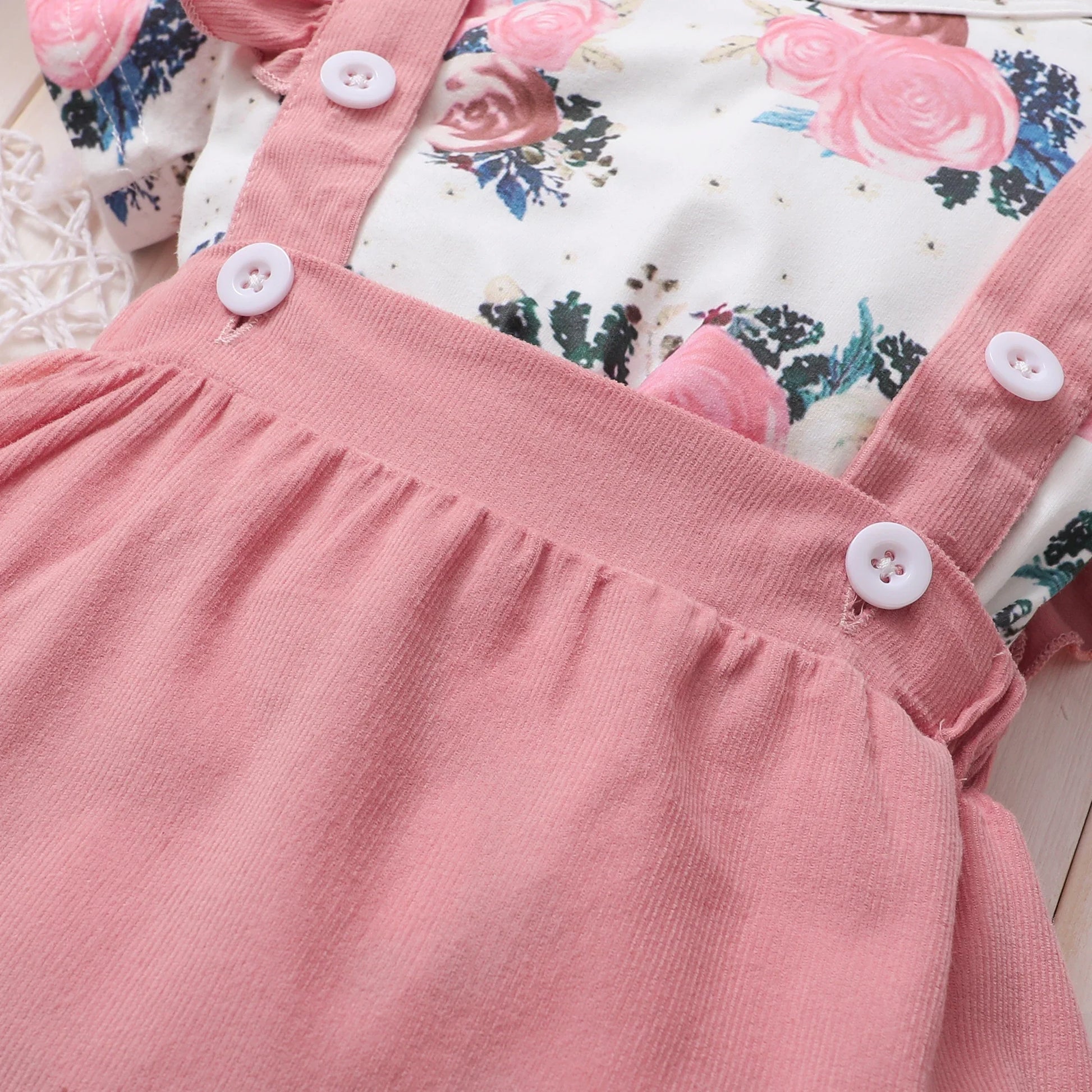Chic baby girl clothes: floral print skirt paired with a coordinating headband