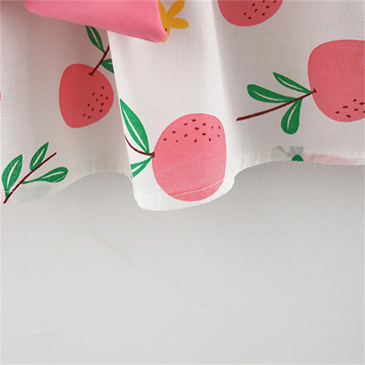 Kids' outfit: Fruit print cotton dress and matching sun hat for a toddler girl.