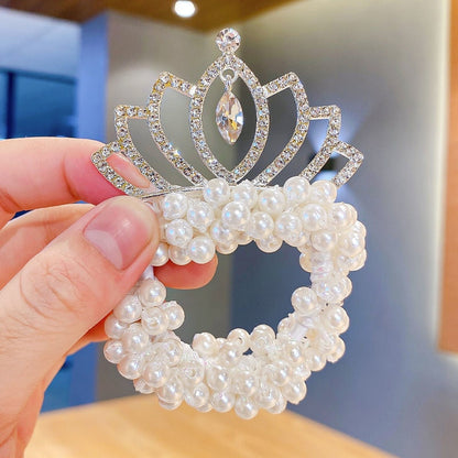 Elegant baby girl's crown headband adorned with faux pearls, perfect for special occasions