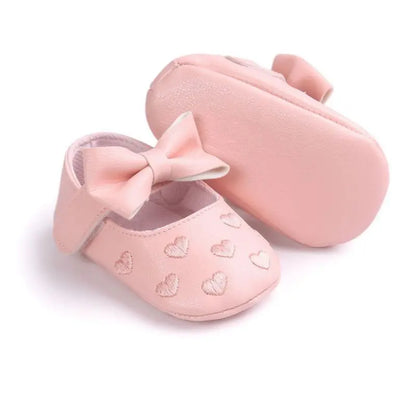 Side profile of breathable baby girl's first walker shoes, designed for comfort and stability