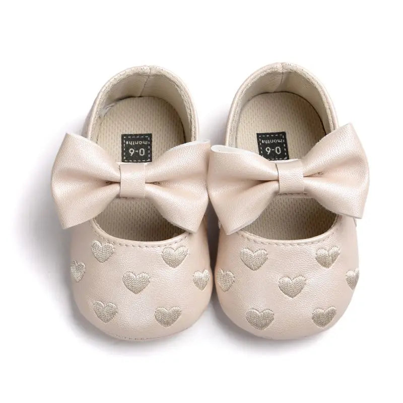 Breathable first walker shoes for baby girls, showcasing non-slip sole and pretty pink color