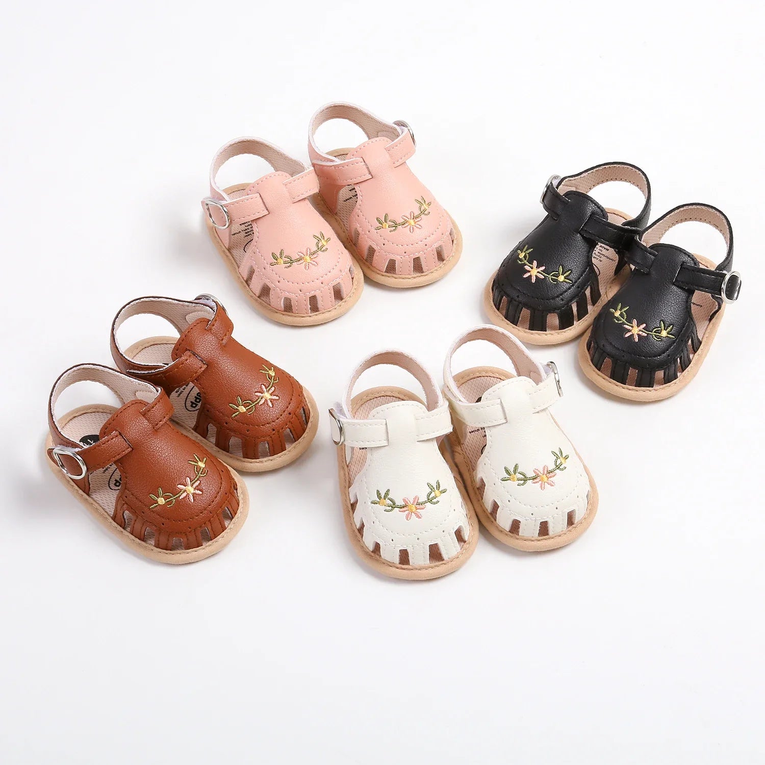 Close-up of a baby girl's blue comfort sandal, ideal for warm weather adventures
