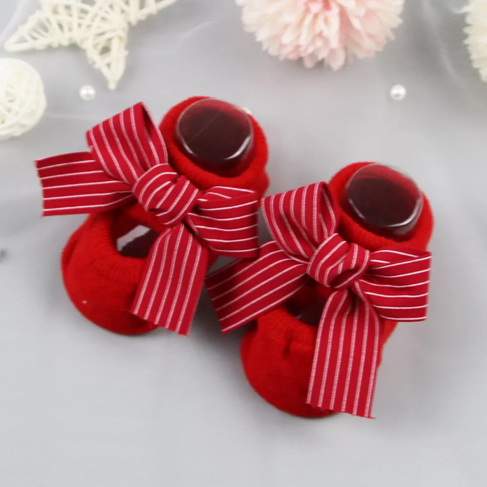 Baby accessories: set of three pairs of baby girl anti-slip bow socks