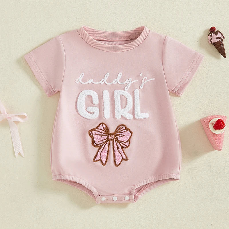 Full view of a pink baby girl's short sleeve romper, embroidered 'Daddy's Girl' infant summer wear