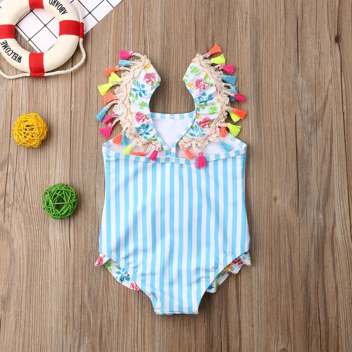 Pink and white flamingo pattern girls' swimwear set, featuring a top and bottom for infants.