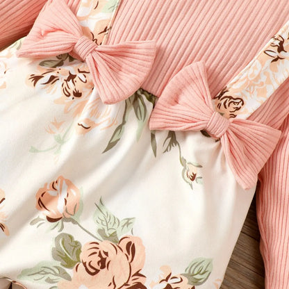 Full view of a baby girl's pink floral romper jumpsuit, perfect for infant spring autumn wear