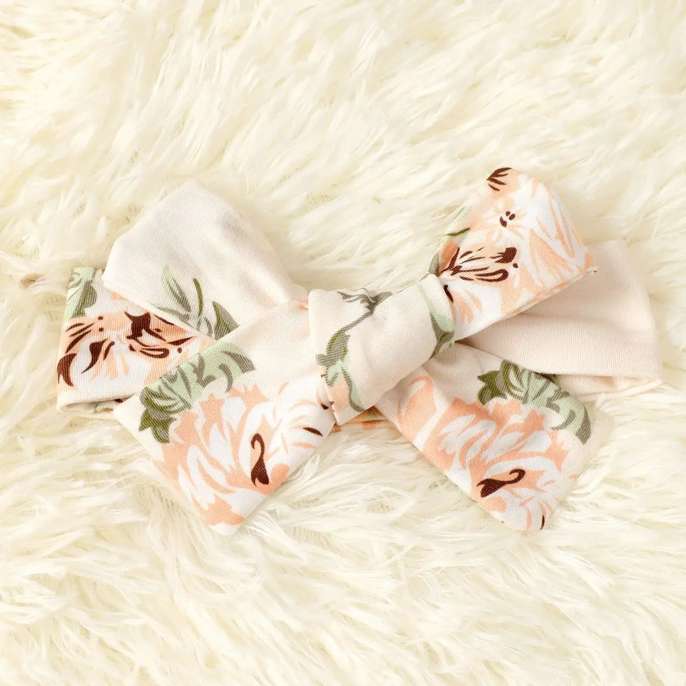 Adorable baby girl in a pink floral romper, stylish one-piece cotton blend infant outfit