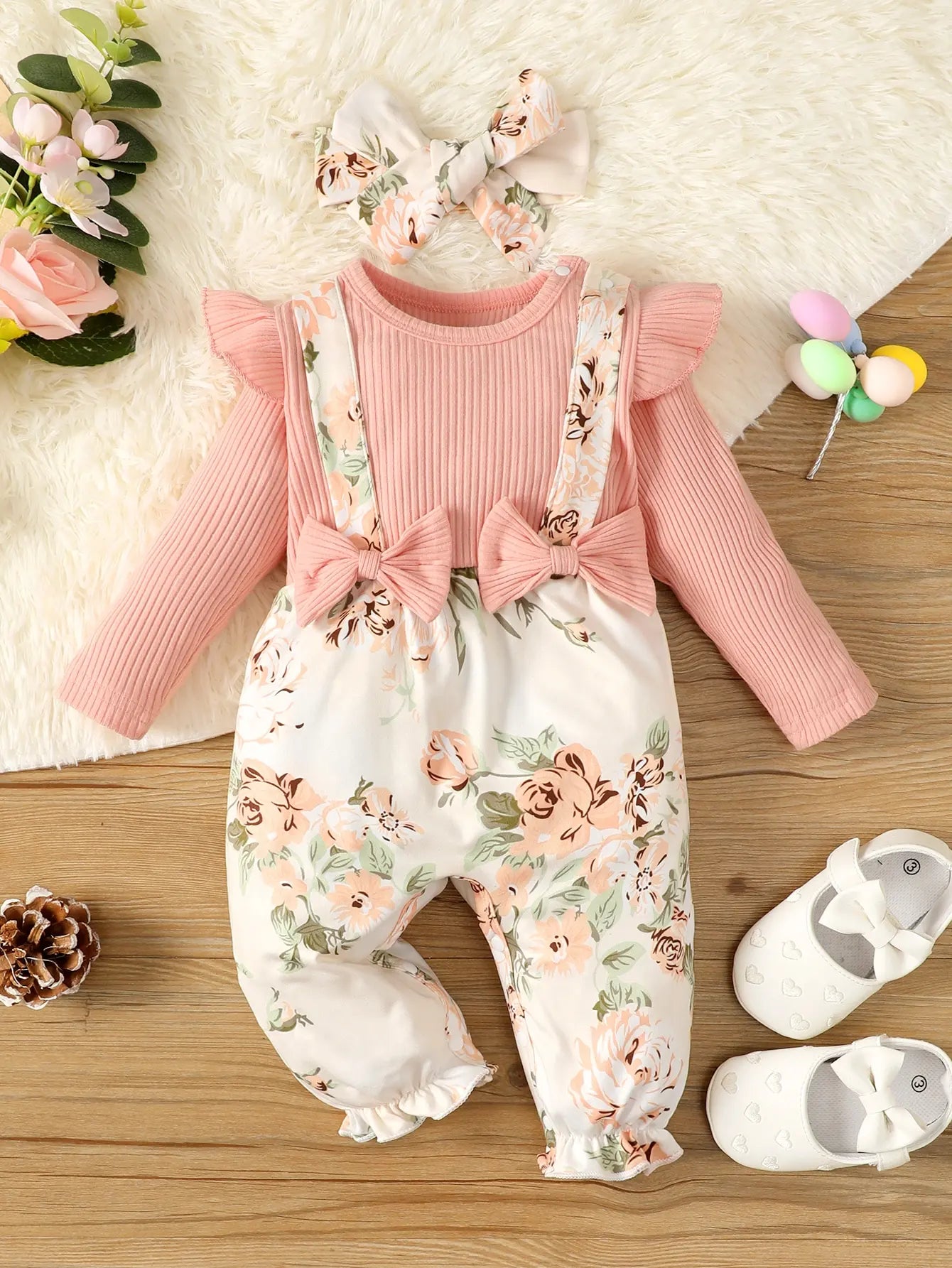 Pink floral baby jumpsuit for girls, a soft cotton blend one-piece infant outfit for newborns