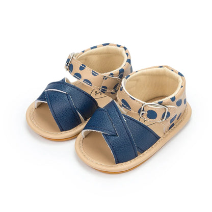 Pair of baby girl's flower sandals in a variety of vibrant summer colors