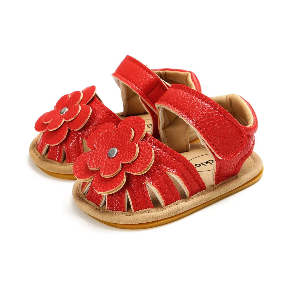 Brown PU leather baby sandals with flower accent, anti-slip flat heel style