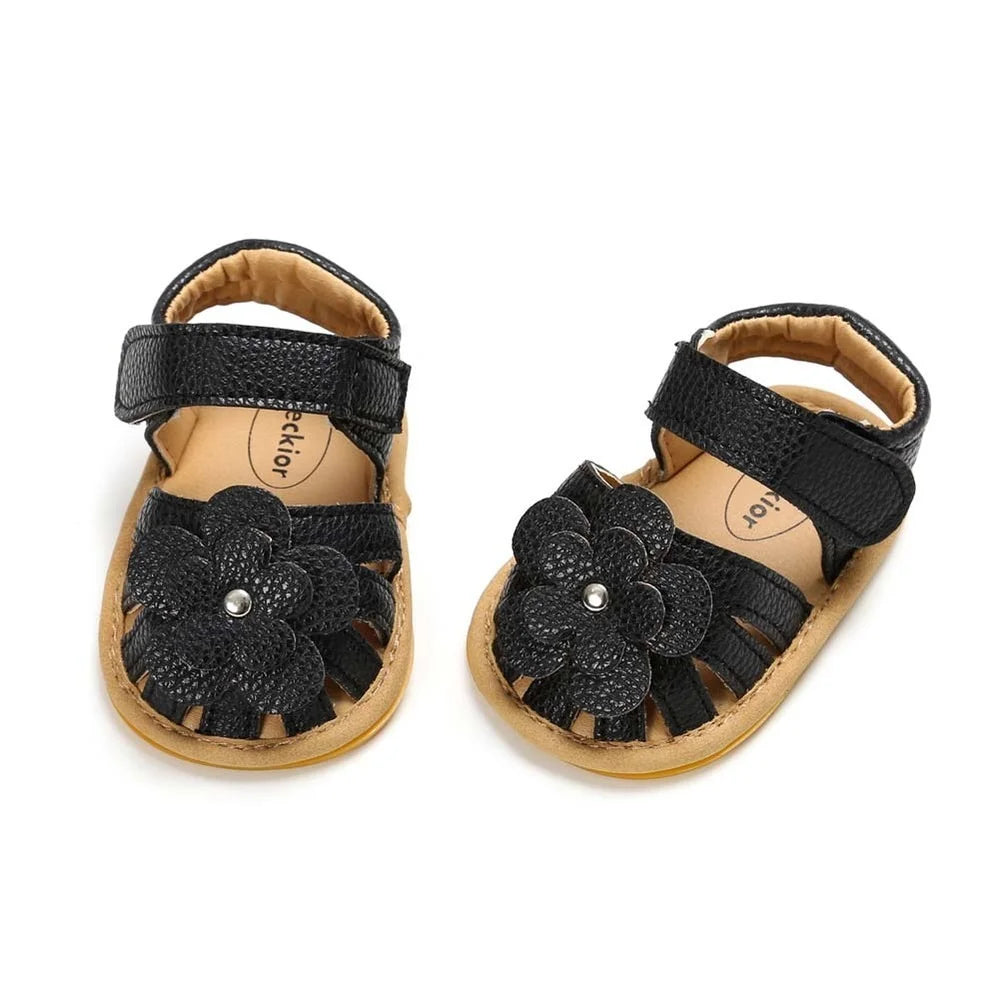 Purple baby sandals featuring floral accents, anti-slip for first steps