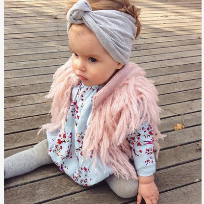 Baby girl's pink knitted tassel sleeveless shrug, perfect for spring autumn, toddler fashion outerwear.