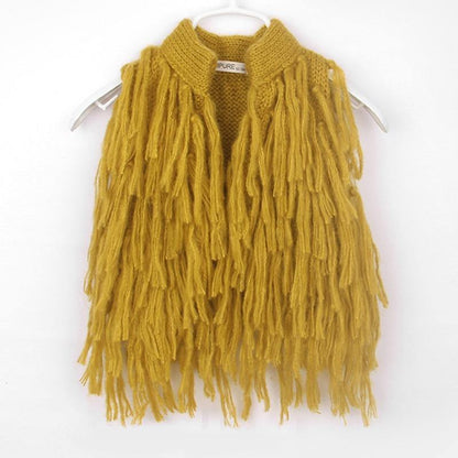 Cute baby girl clothes: a sleeveless knitted shrug with decorative tassels, toddler fashion.