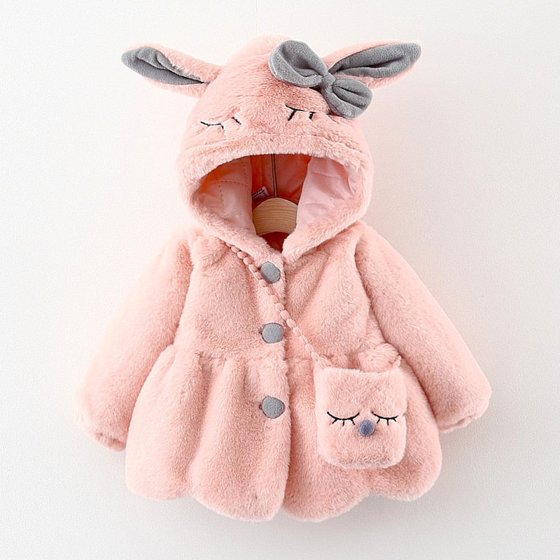 Back view of a baby girl's plush hooded jacket, showcasing the cute rabbit ears and warm design.