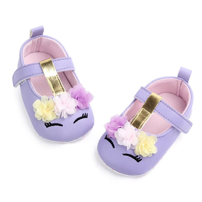 Flower adorned prewalker shoes for baby girls, offering soft support for first steps.