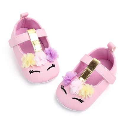 Soft infant flower shoes for baby girls, ideal for pre-walking and comfort.