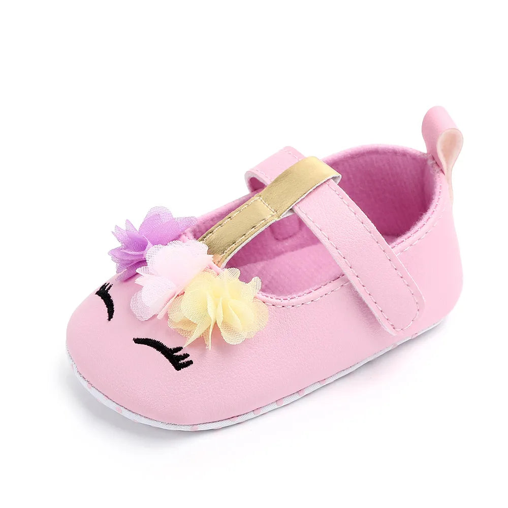 Baby fashion flower shoes in pink, designed for pre-walking comfort and style.