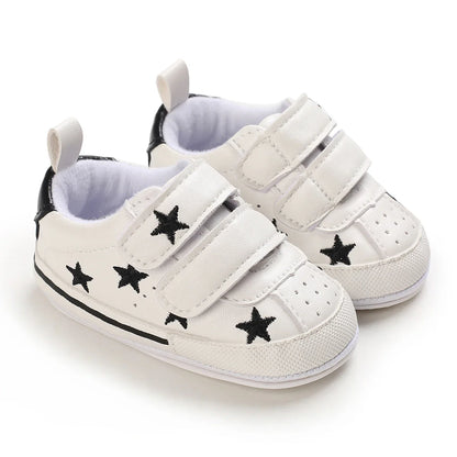 Newborn girl's first walking shoes, yellow with heart prints, flexible and gentle on feet