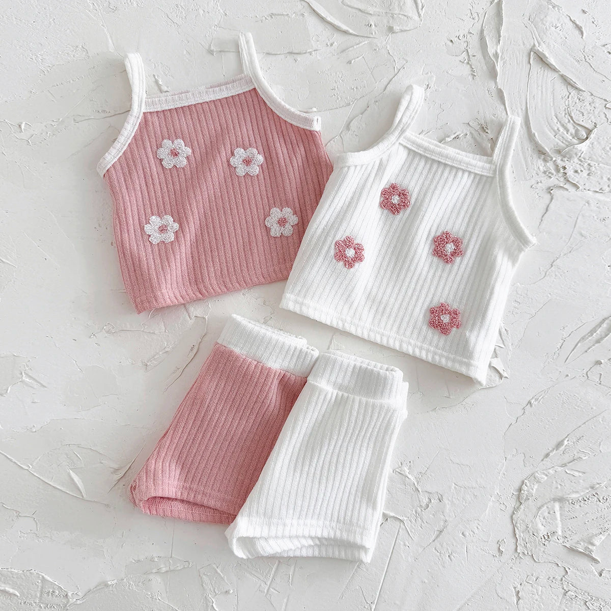 Baby girl's ribbed floral camisole and shorts set, a cute summer infant outfit for toddlers.