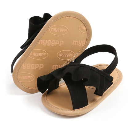 Stylish baby girl's white ruffled sandals, soft sole, velcro closure, first walker shoes