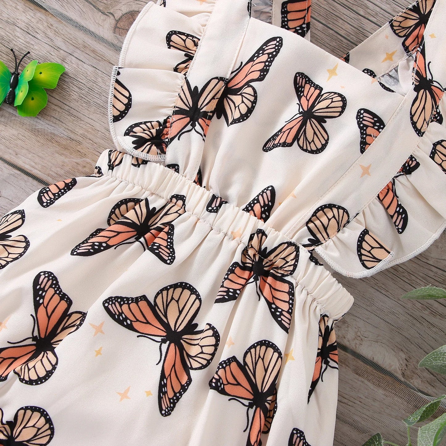 Pink butterfly print sleeveless bodysuit for baby girls, a perfect and comfortable infant clothing