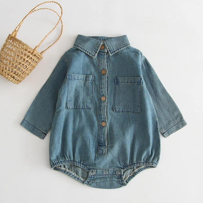 Baby girl's soft denim romper jumpsuit with long sleeves, perfect infant fashion outfit.