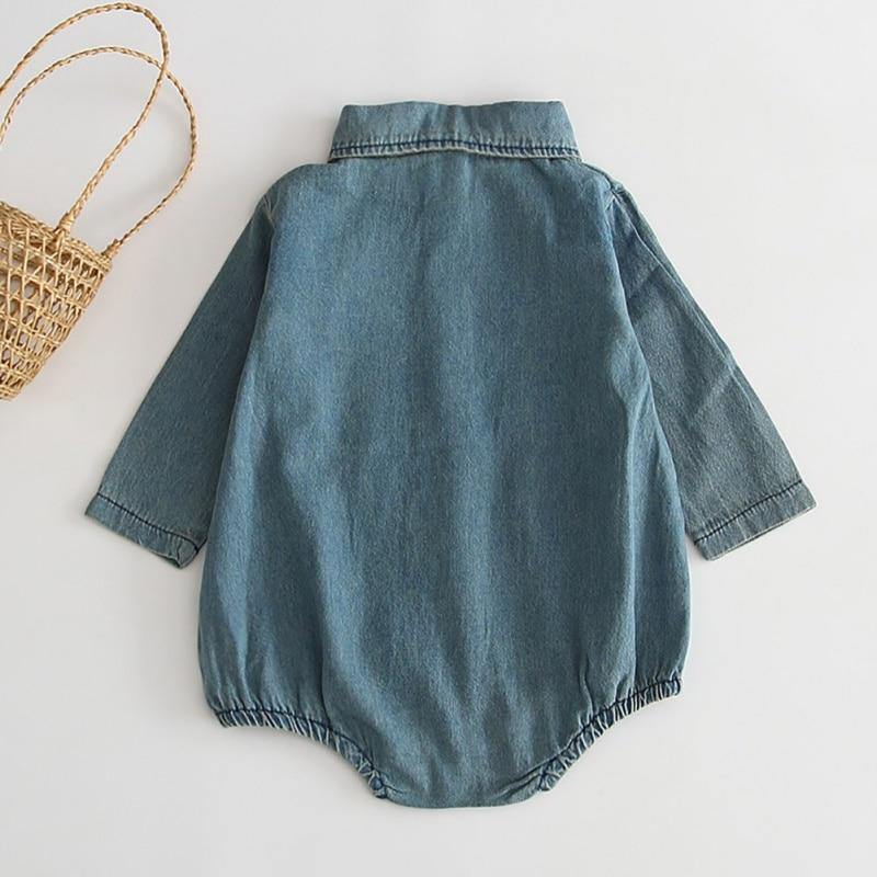 Comfortable cotton baby girl's denim jumpsuit romper, ideal for everyday wear and play.