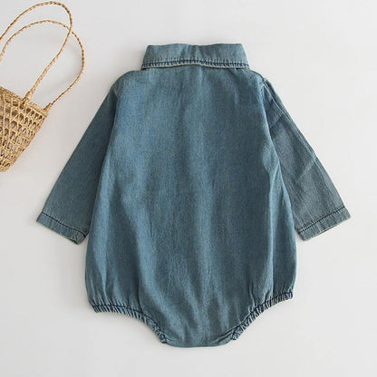 Comfortable cotton baby girl's denim jumpsuit romper, ideal for everyday wear and play.