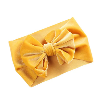 Infant accessory: a charming rust orange velvet bow winter headband for girls