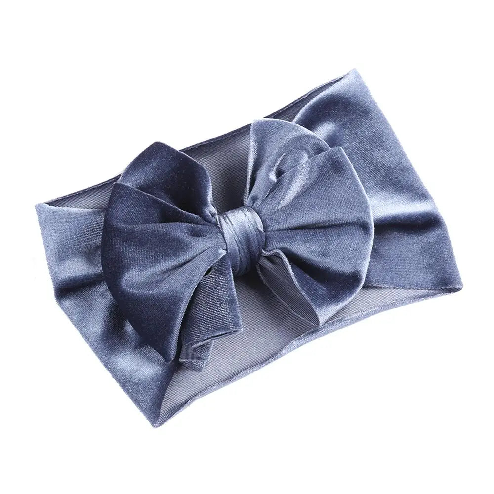 Toddler fashion: a cream velvet bow winter headband, soft and warm for little heads
