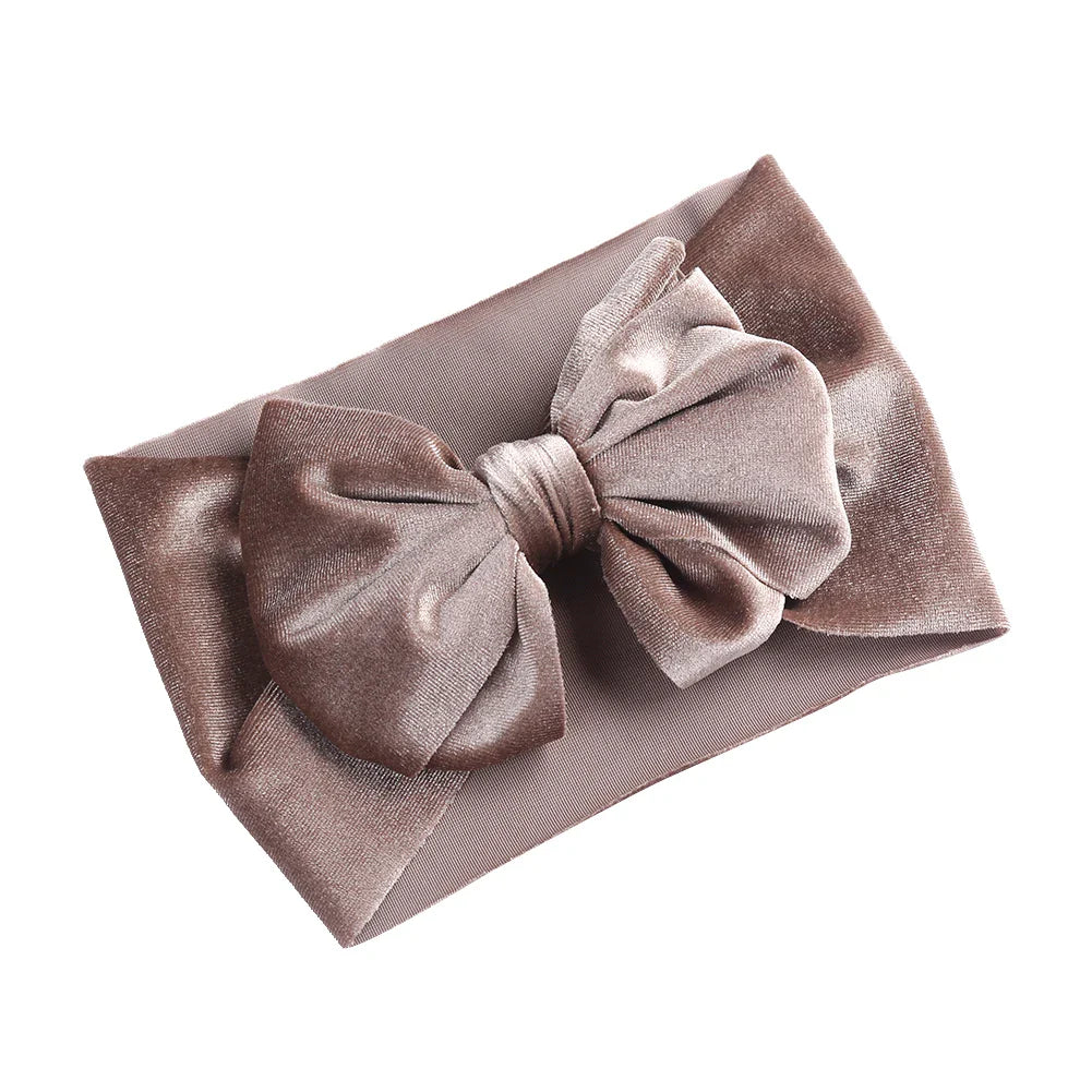 Soft velvet bow winter headband in a classic brown, for baby girls