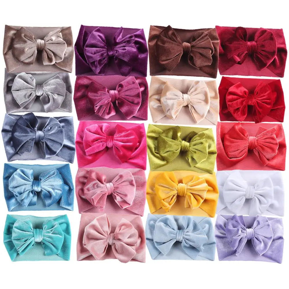 Soft peach velvet bow baby headband, elastic and comfortable for winter wear