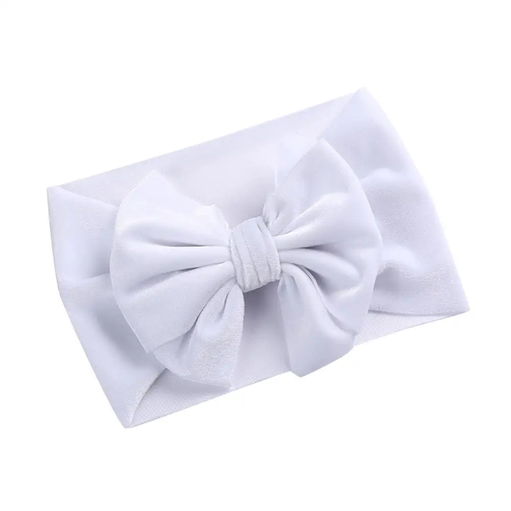 Velvet bow baby headband in navy blue, essential winter accessory for baby girls