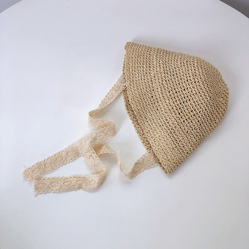 Toddler girl's straw sun hat with charming lace trim, offering style and shade for warm weather.