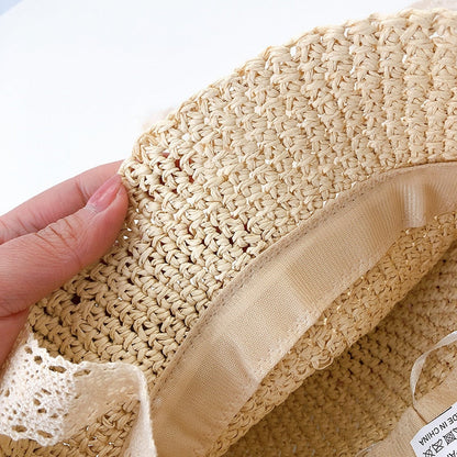 Adorable infant straw sun hat for girls, featuring a delicate lace trim, great for any summer outfit.